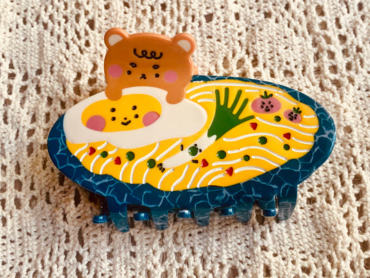 Plate of noodles hair claws